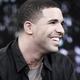 Illustration for article titled Drake’s emoji tattoo mocked, venerated by new Tumblr